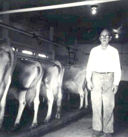  - Macy Mack in his dairy barn, about 1958